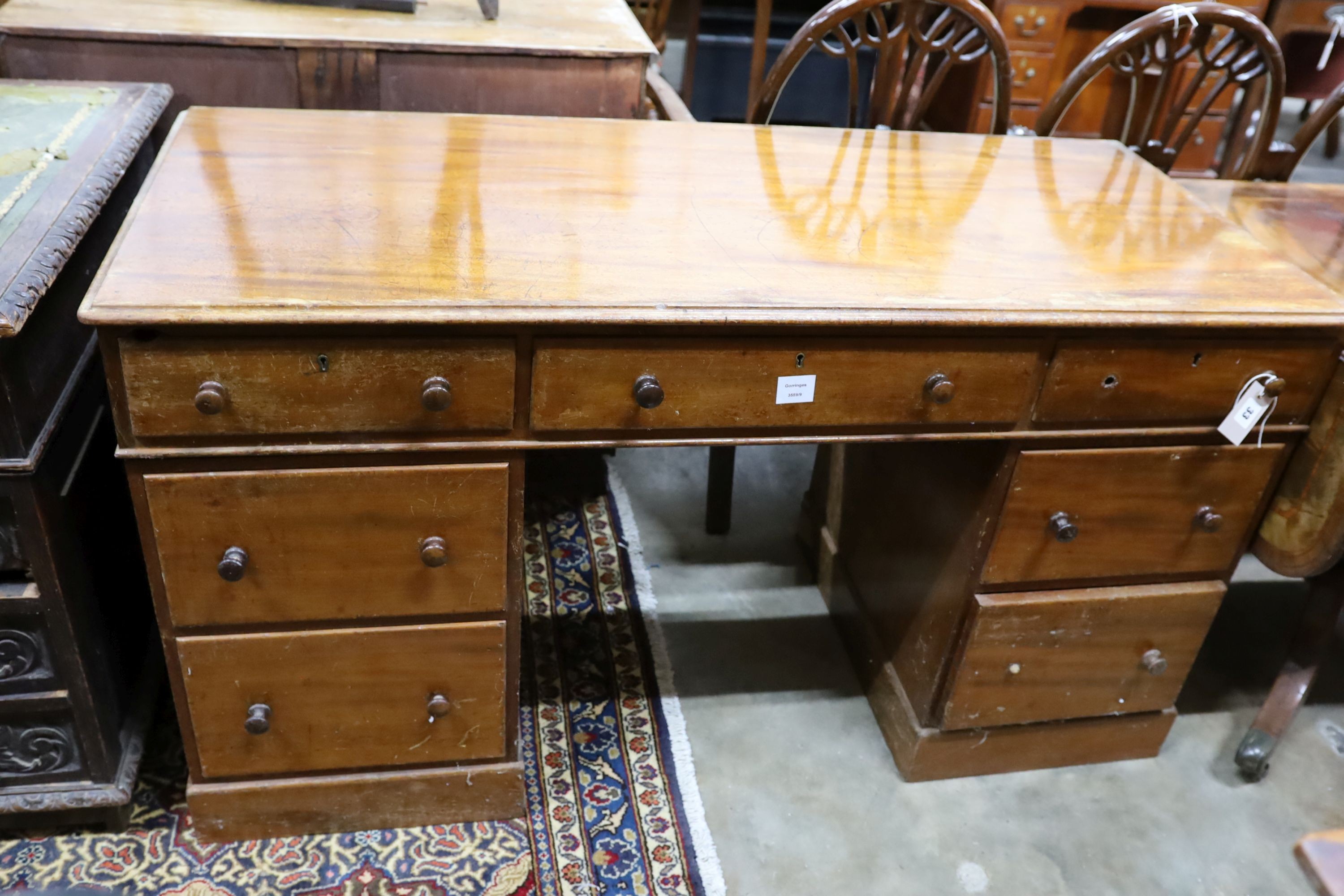 A Victorian mahogany pedestal desk, length 136cm, depth 58cm, height 76cm